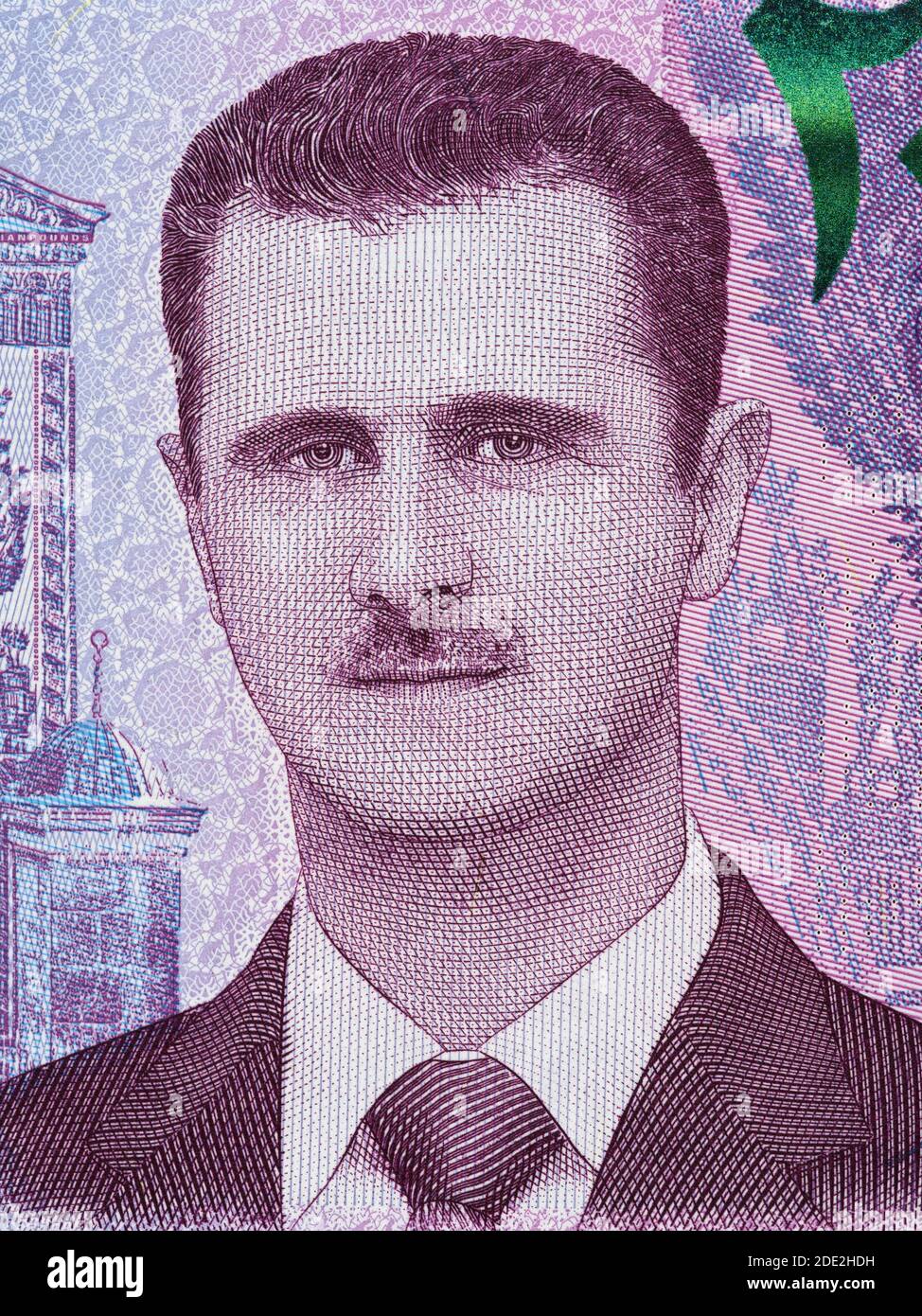 Ritratto di Bashar Assad sulla Siria 2000 libbre closeup di banconote macro, soldi siriani primo piano Foto Stock