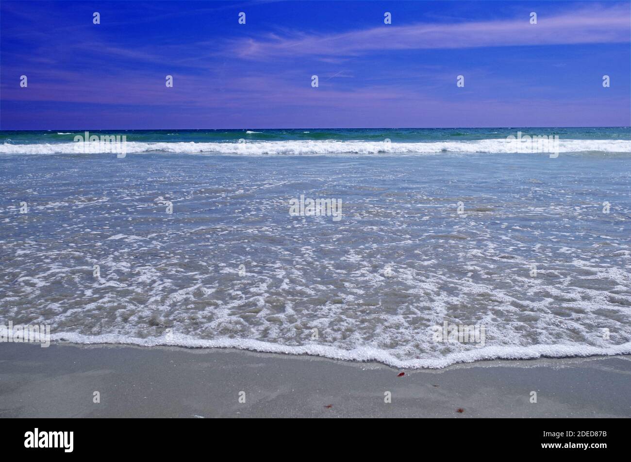 Onde di rottura e di scorrimento Foto Stock