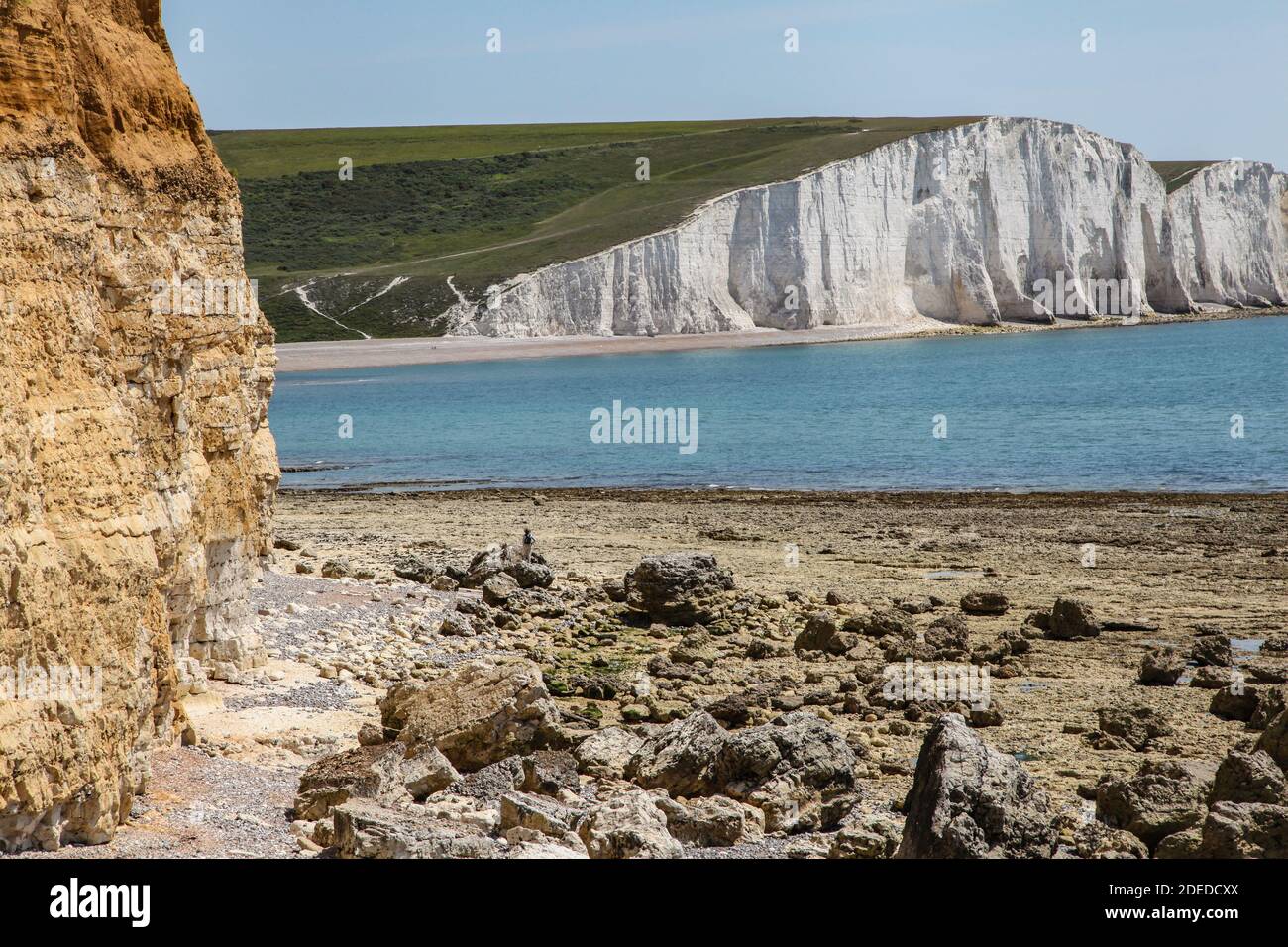 L'unico estuario del fiume non sviluppato del Sussex contiene i paesaggi più intriganti della costa meridionale, protetti dai sistemi NT, Country Park e SSSI. Foto Stock