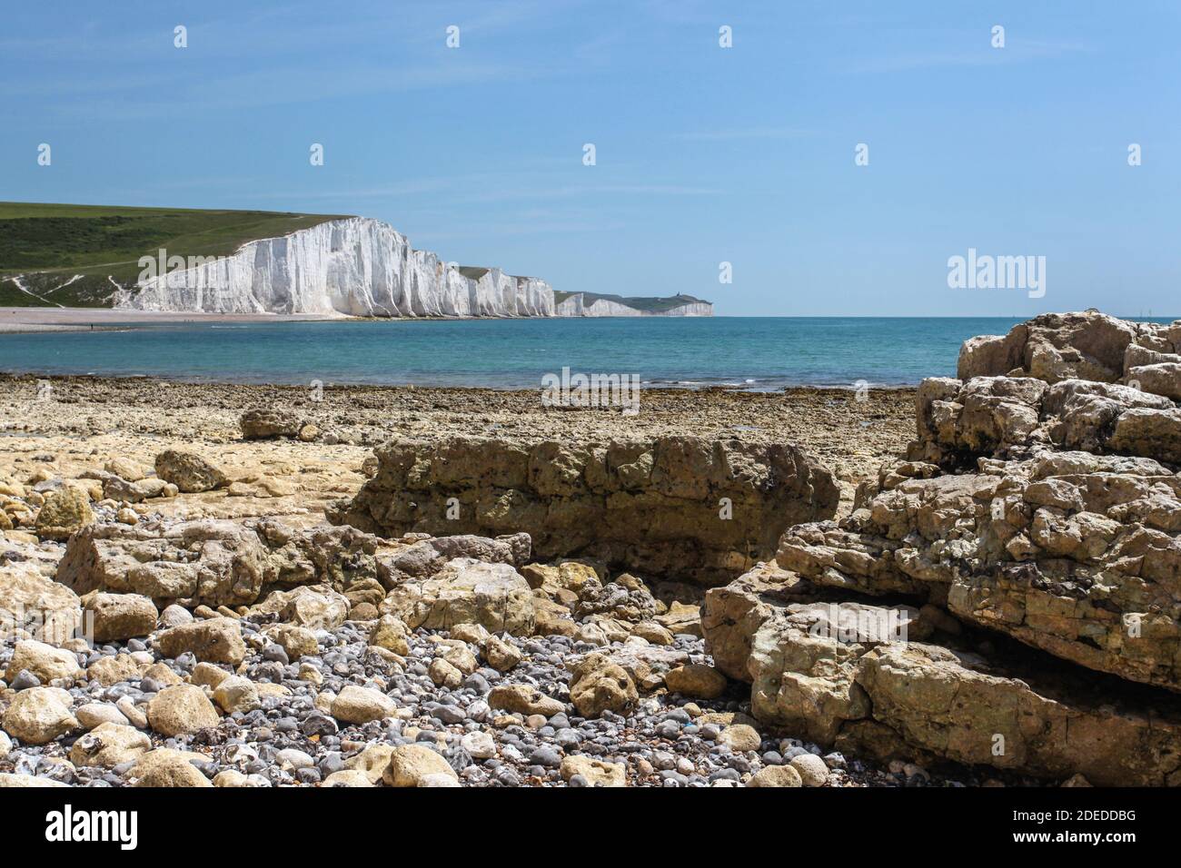 L'unico estuario del fiume non sviluppato del Sussex contiene i paesaggi più intriganti della costa meridionale, protetti dai sistemi NT, Country Park e SSSI. Foto Stock