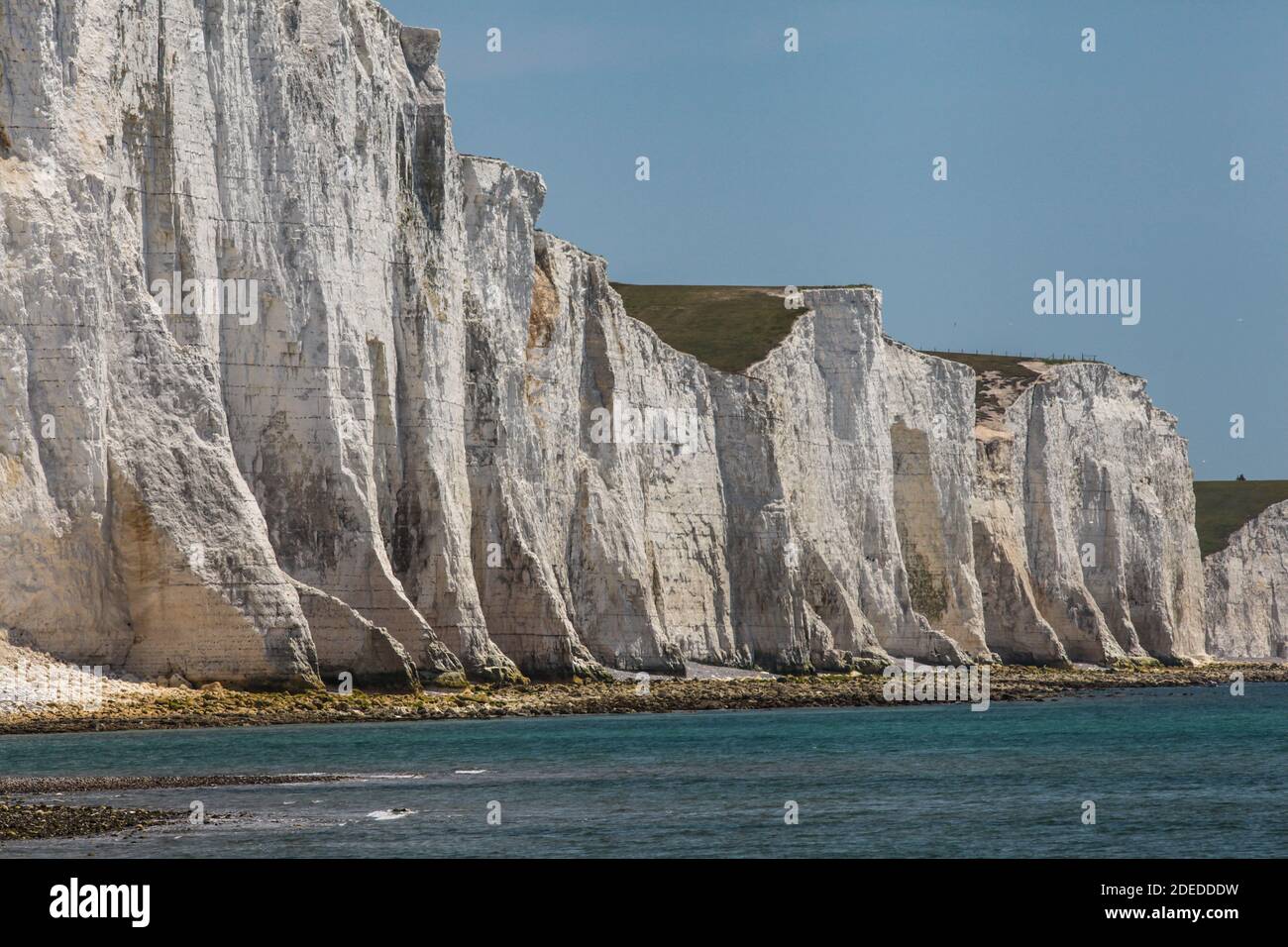 L'unico estuario del fiume non sviluppato del Sussex contiene i paesaggi più intriganti della costa meridionale, protetti dai sistemi NT, Country Park e SSSI. Foto Stock