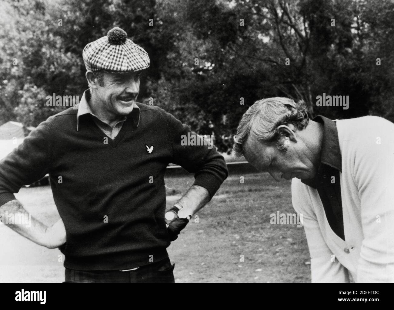 Sean Connery, Arnold Palmer durante una partita di golf, circa 1976 / riferimento file n. 34000-863THA Foto Stock