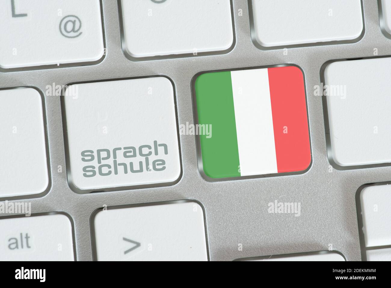 Computer e chiavi per la scuola di lingua italiana Foto Stock