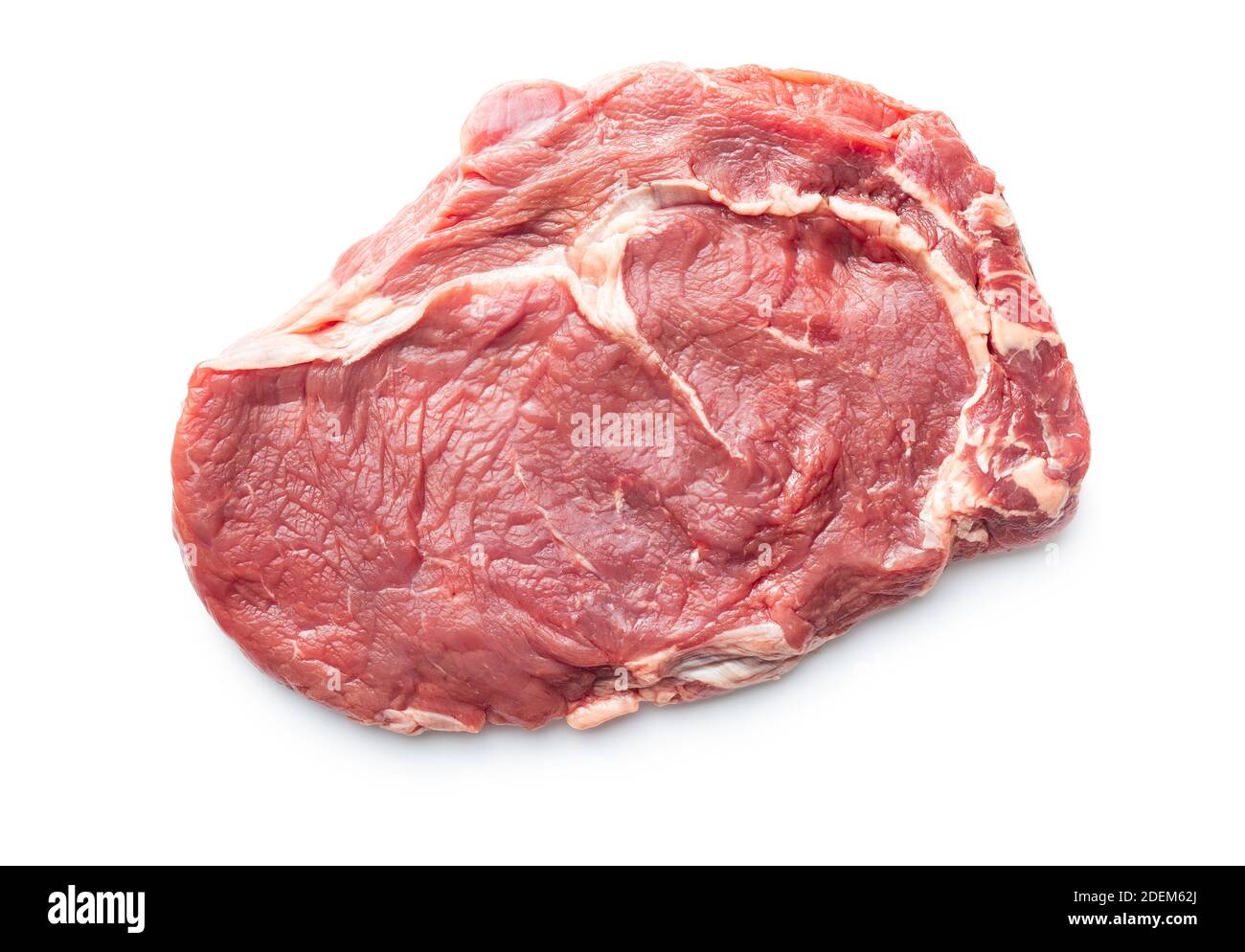 Bistecca di ribeye grezza tagliata isolata su sfondo bianco. Vista dall'alto. Foto Stock