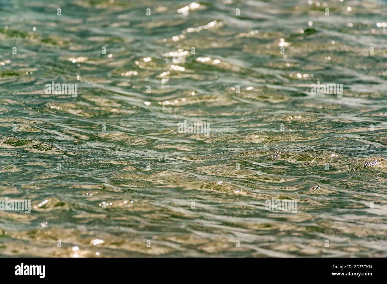 Abbagliamento sulle onde del Golfo del Messico. Sfondo astratto Foto Stock