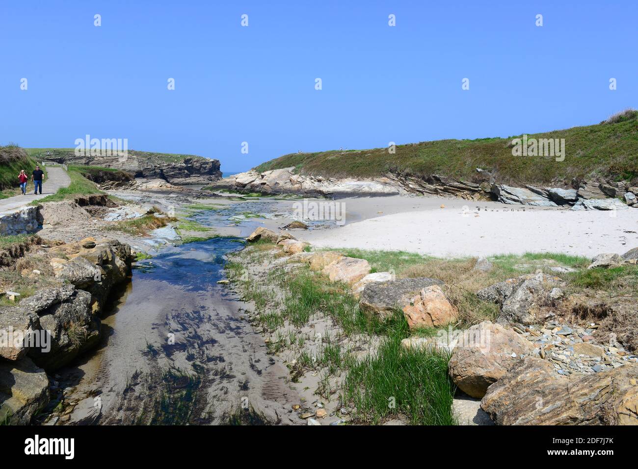 Praia de Esteiro (spiaggia di Esteiro), bassa marea. Ribadeo, provincia di Lugo, Galizia, Spagna. Foto Stock