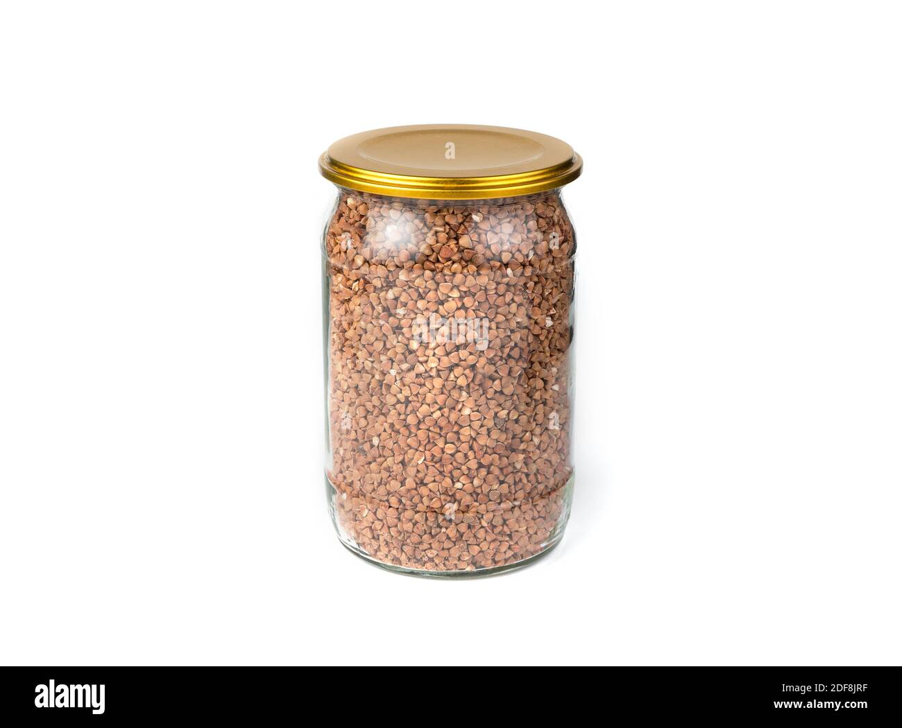 Banca con grano saraceno su sfondo bianco. Foto Stock