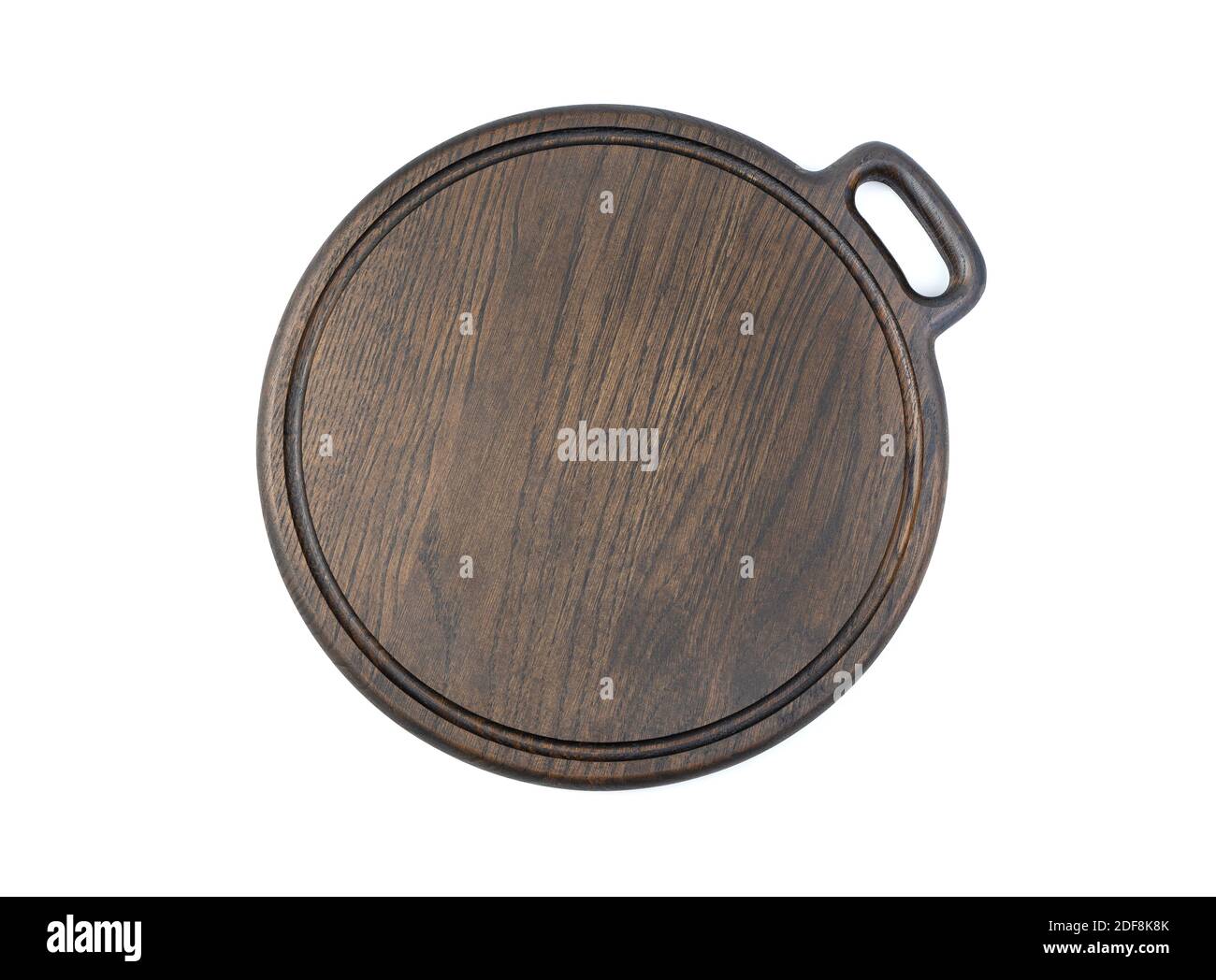 Il tagliere è marrone scuro su sfondo bianco. Foto Stock