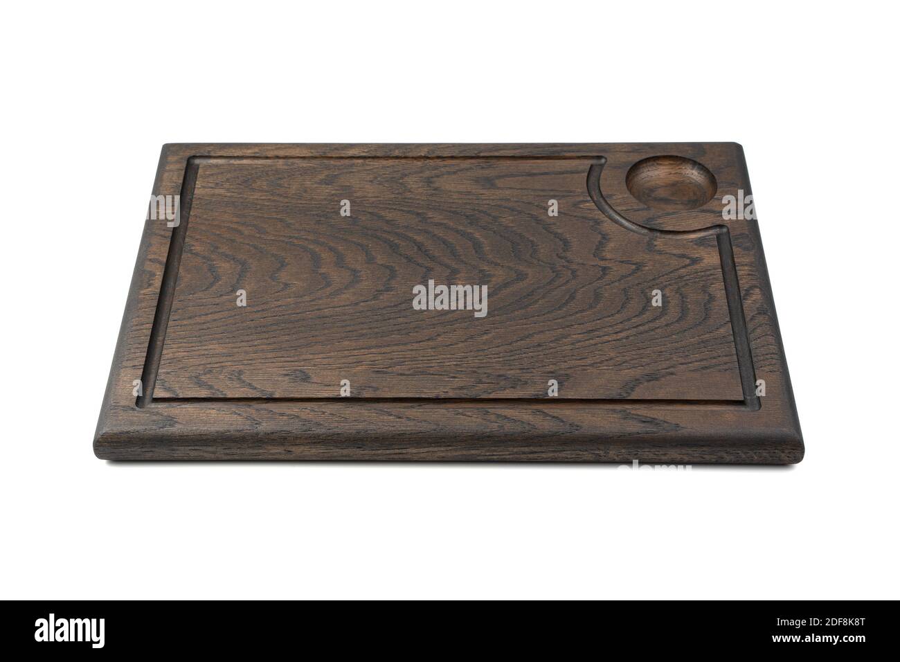 La tavola da cucina è marrone scuro su sfondo bianco. Foto Stock