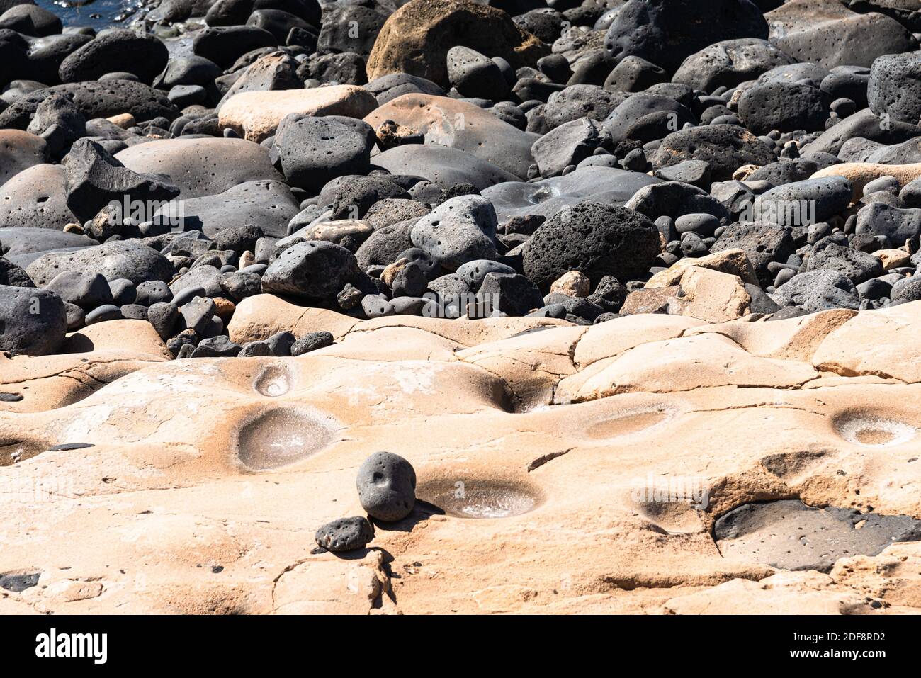 Rocce vulcaniche struttura pietra lavica liscia struttura di fondo. Foto Stock