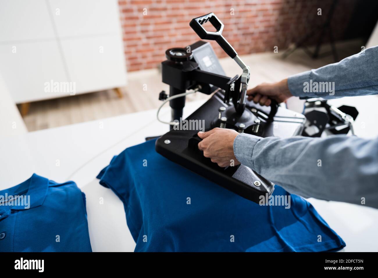 Stampa di magliette con trasferimento termico. Merchandising TShirt Foto Stock