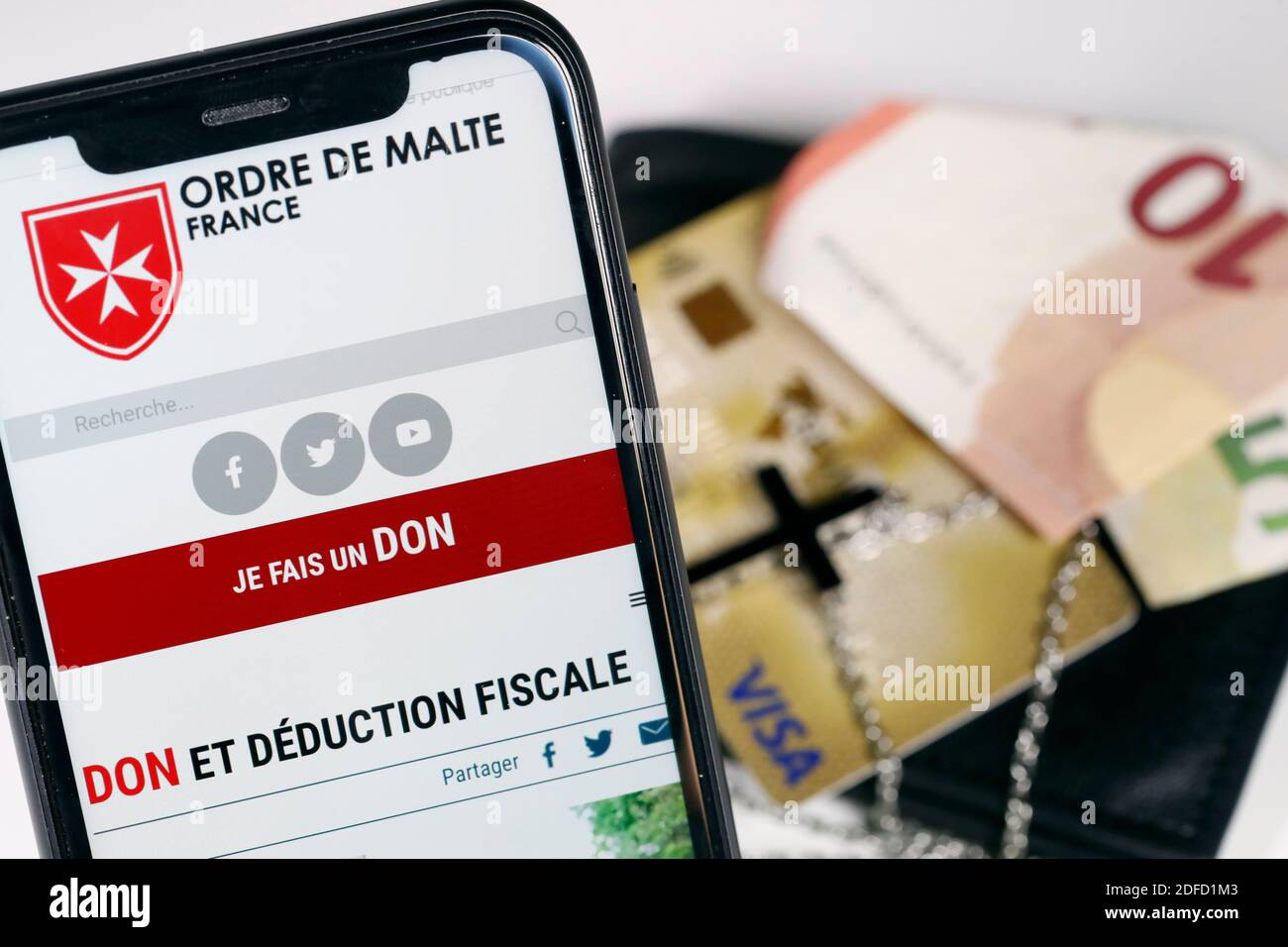 Raccolta di fondi su uno smartphone per ordre de malte Foto Stock