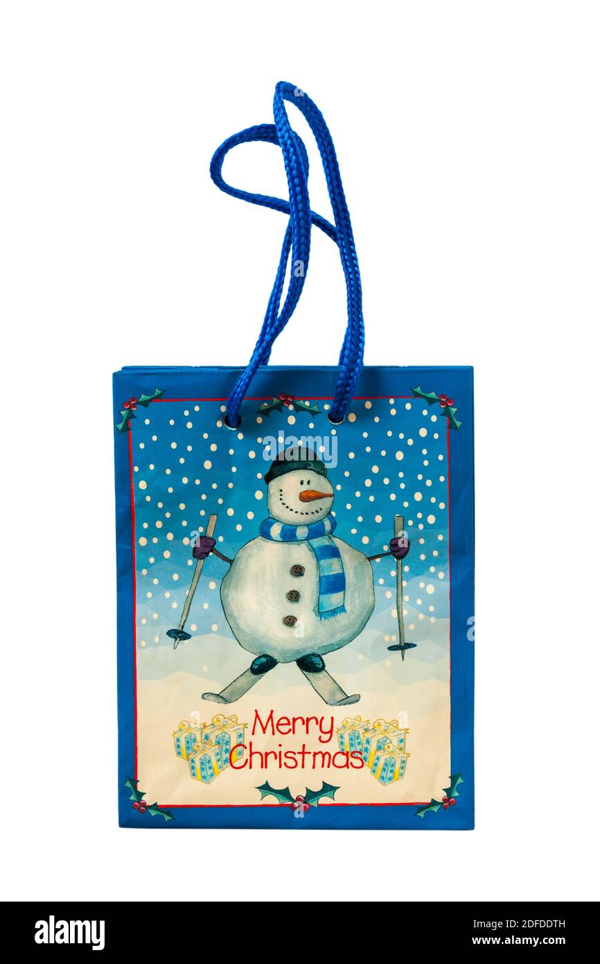 Borsa regalo di Natale con pupazzo di neve su isolato su bianco sfondo Foto Stock