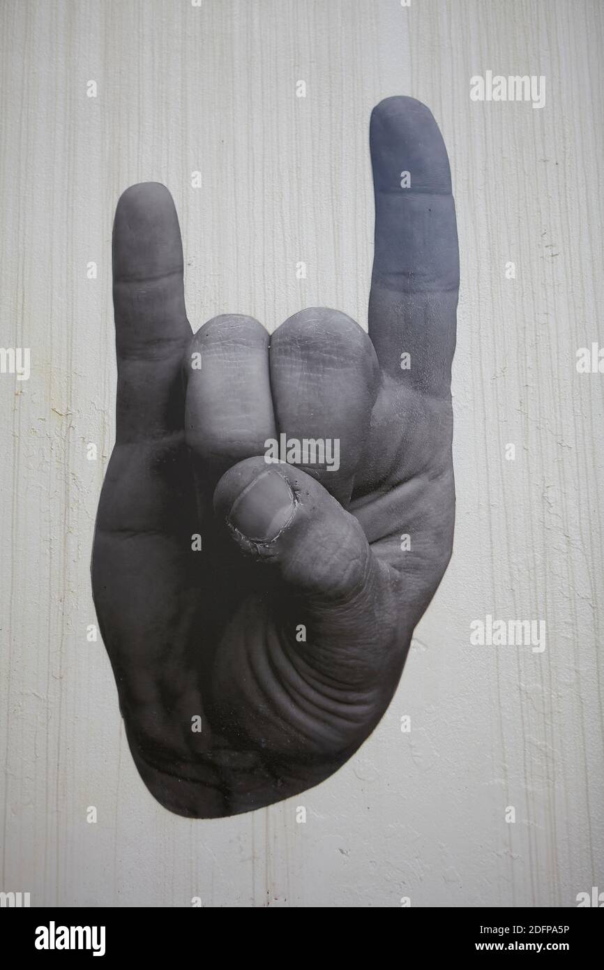 il segno diavolo mani graffiti Foto Stock