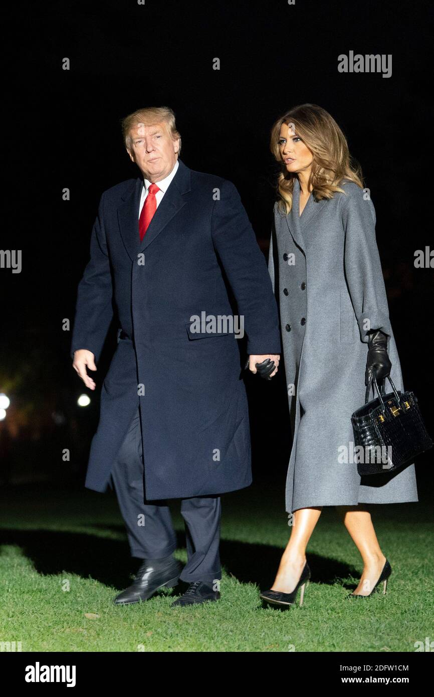 11 novembre 2018 - Washington, DC, Stati Uniti: Il presidente degli Stati Uniti Donald J. Trump e la First Lady Melania Trump tornano alla Casa Bianca dopo aver partecipato a eventi che segnano il 100° anniversario dell'armistizio della prima guerra mondiale. (Chris Kleponis/Polaris) Foto Stock