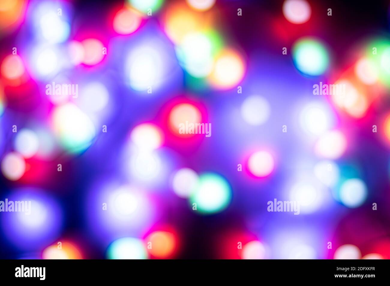 Bokeh e offuscare luci spot su sfondo astratto multicolore Foto Stock