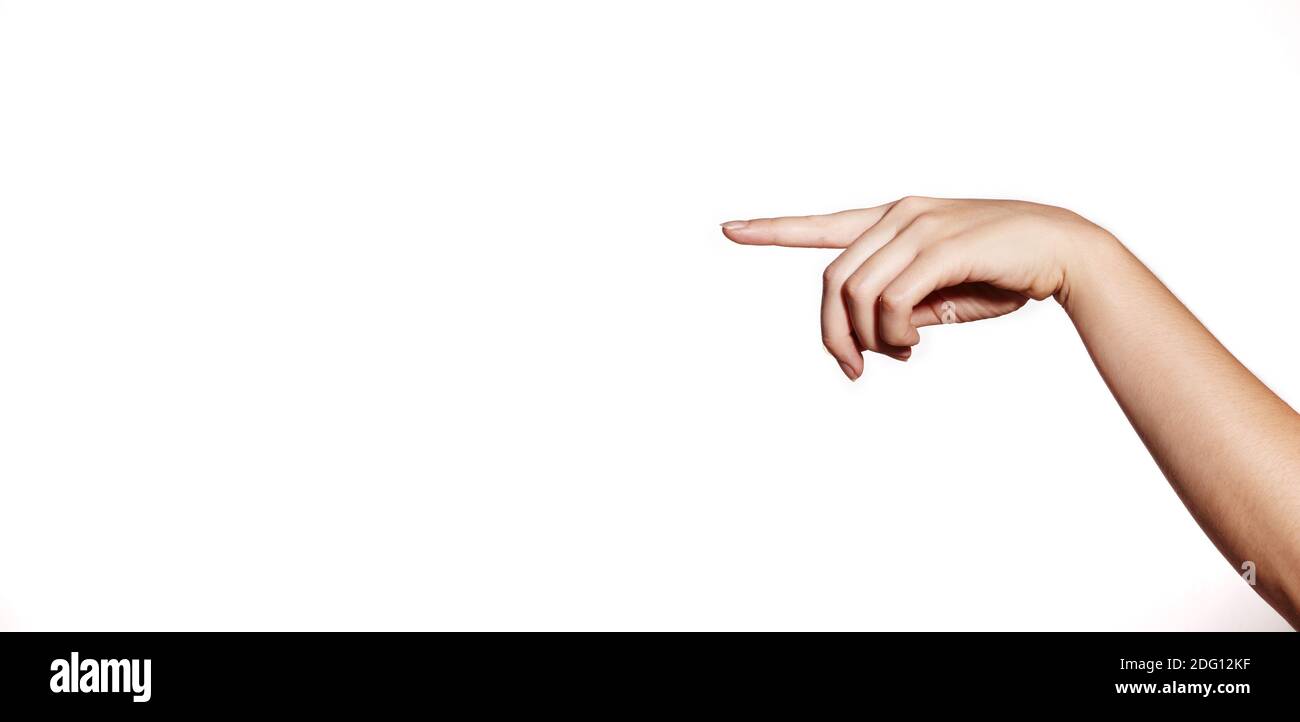Puntatore a mano su sfondo bianco. Bella mano femminile. Un dito che tocca o preme Foto Stock