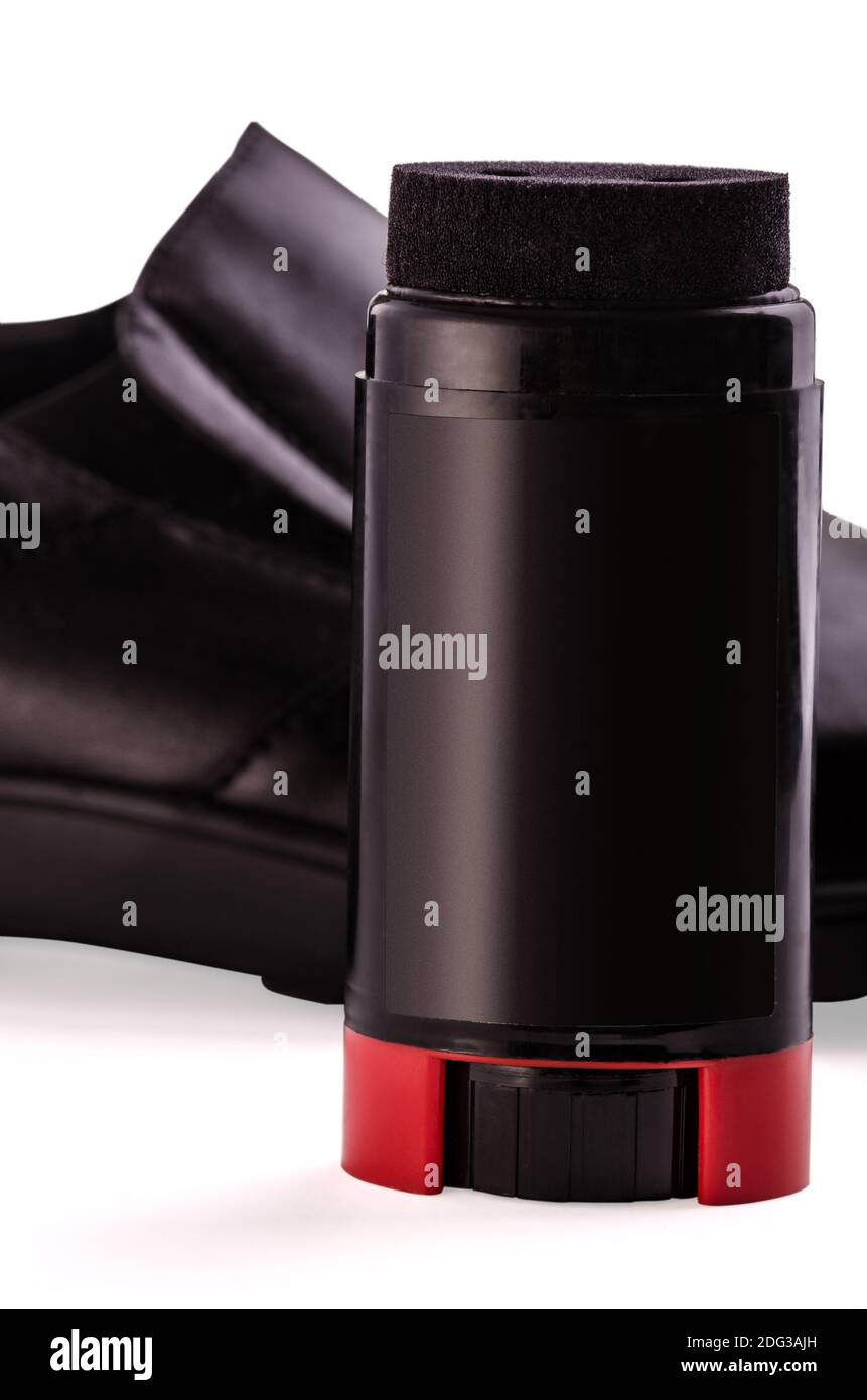 Scarpe e crema per scarpe Foto Stock