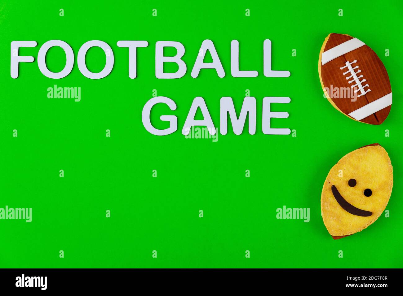 Gioco di calcio di testo con biscotti come una palla di rugby. Gioco sportivo americano. Foto Stock