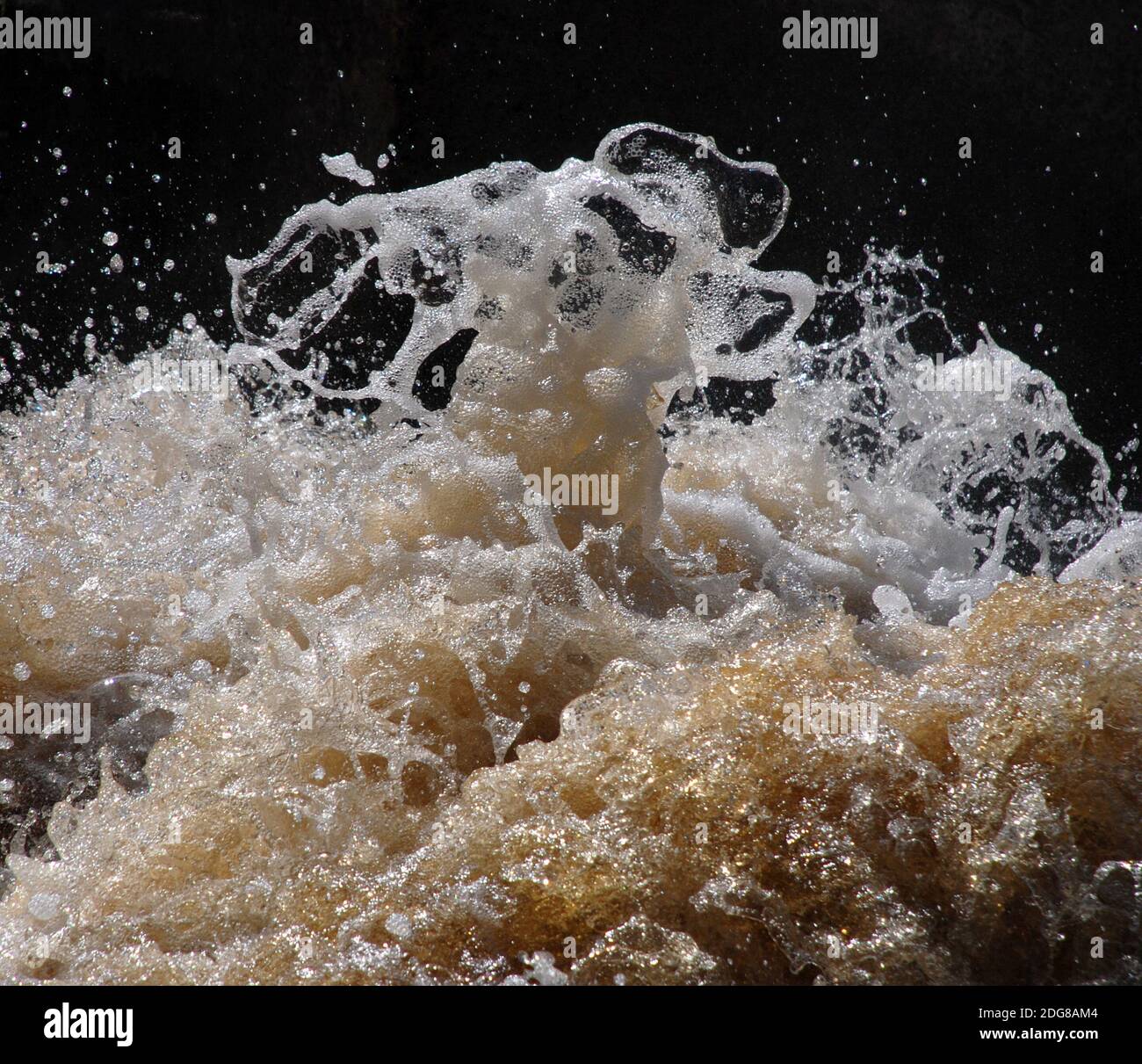 Spruzzi di onde Foto Stock