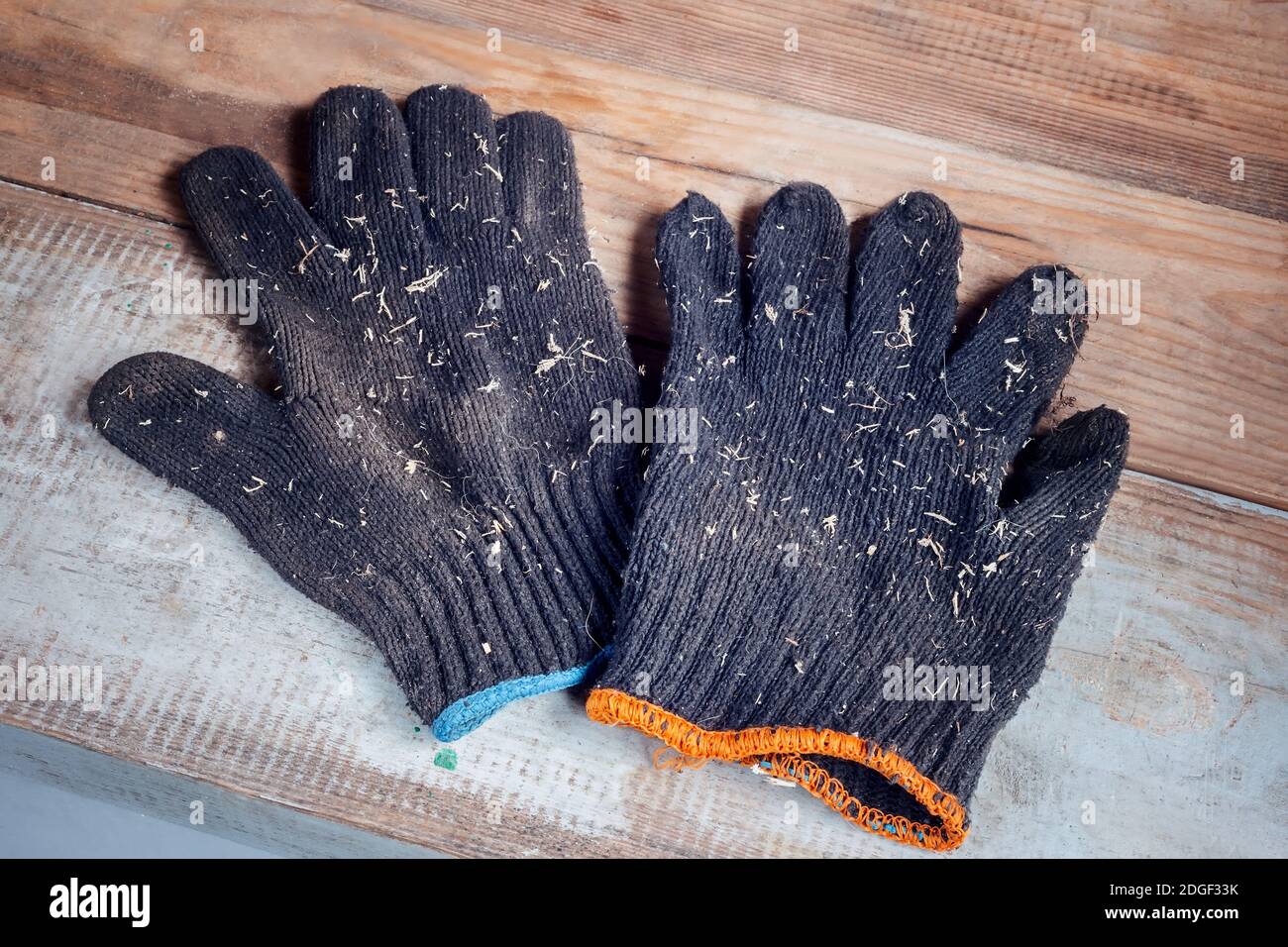 Guanti di cotone per proteggere le mani durante il lavoro Foto Stock