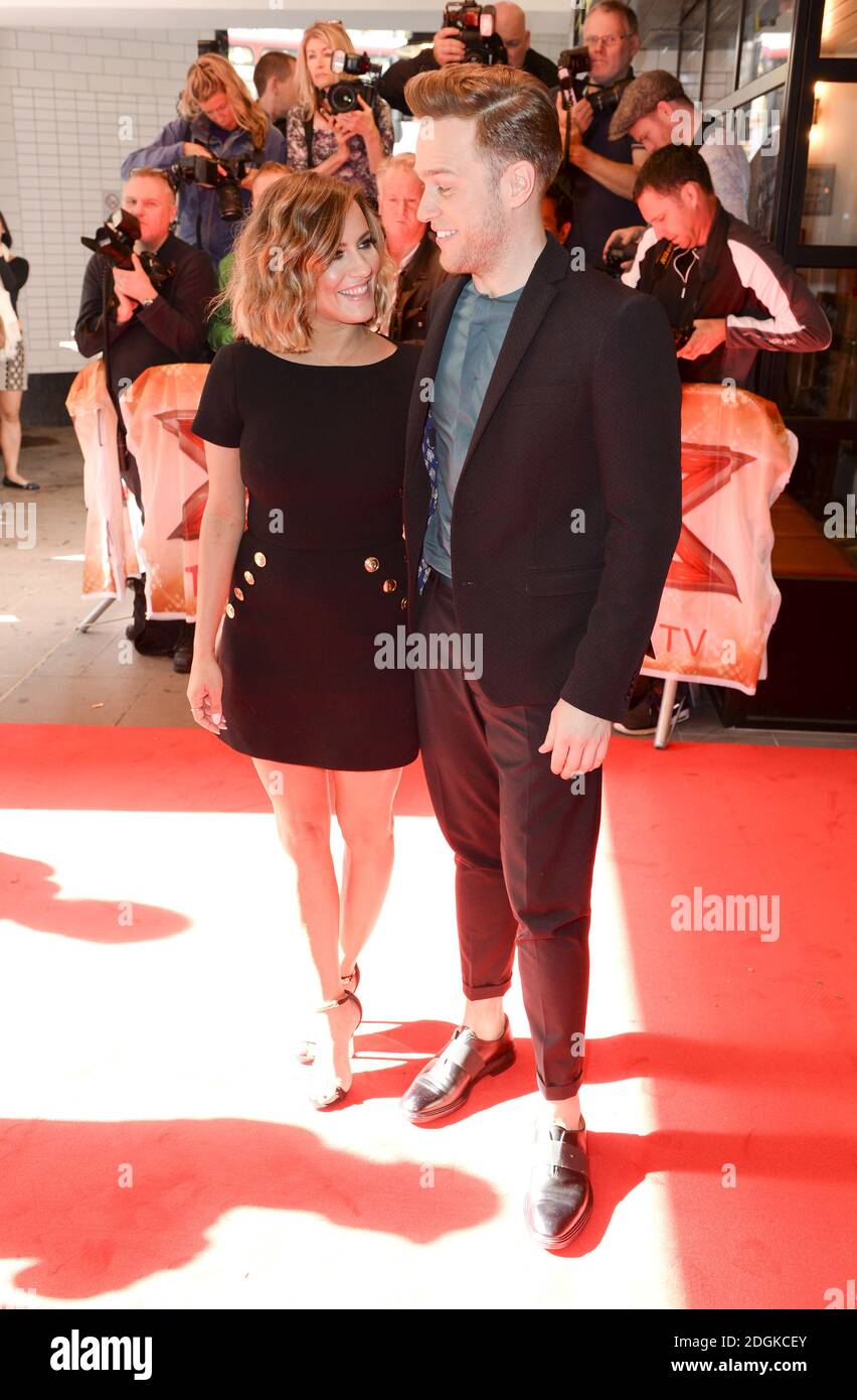 Caroline Flack e Olly Murs partecipano all'X Factor Media Launch tenutosi presso Playhouse Central su Shaftesbury Avenue, Londra. Il credito fotografico dovrebbe essere: Doug Peters/ EMPICS Entertainment Foto Stock