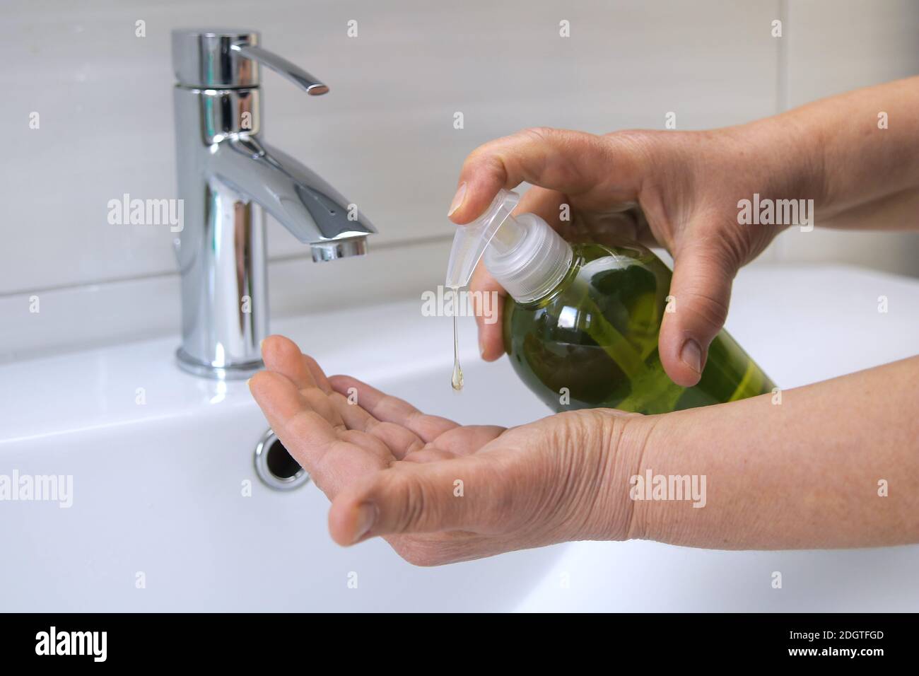 Lavarsi le mani Foto Stock