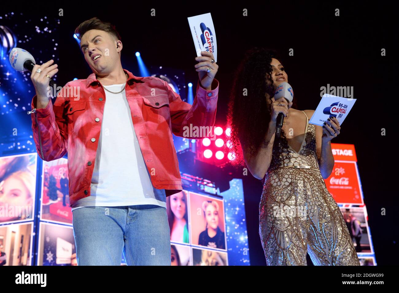 Vick Hope e Roman Kemp sul palco durante il primo giorno del Capital's Jingle Bell Ball 2018 con Coca-Cola all'O2 Arena, Londra. Il credito immagine dovrebbe essere: Doug Peters/EMPICS Entertainment Foto Stock