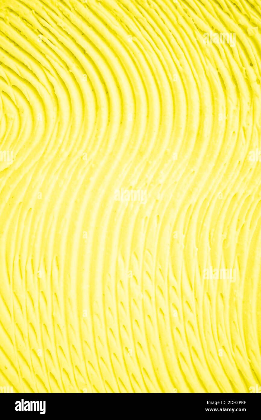Sfondo di onde astratte testurizzate di colore giallo di 2021 anni Foto Stock
