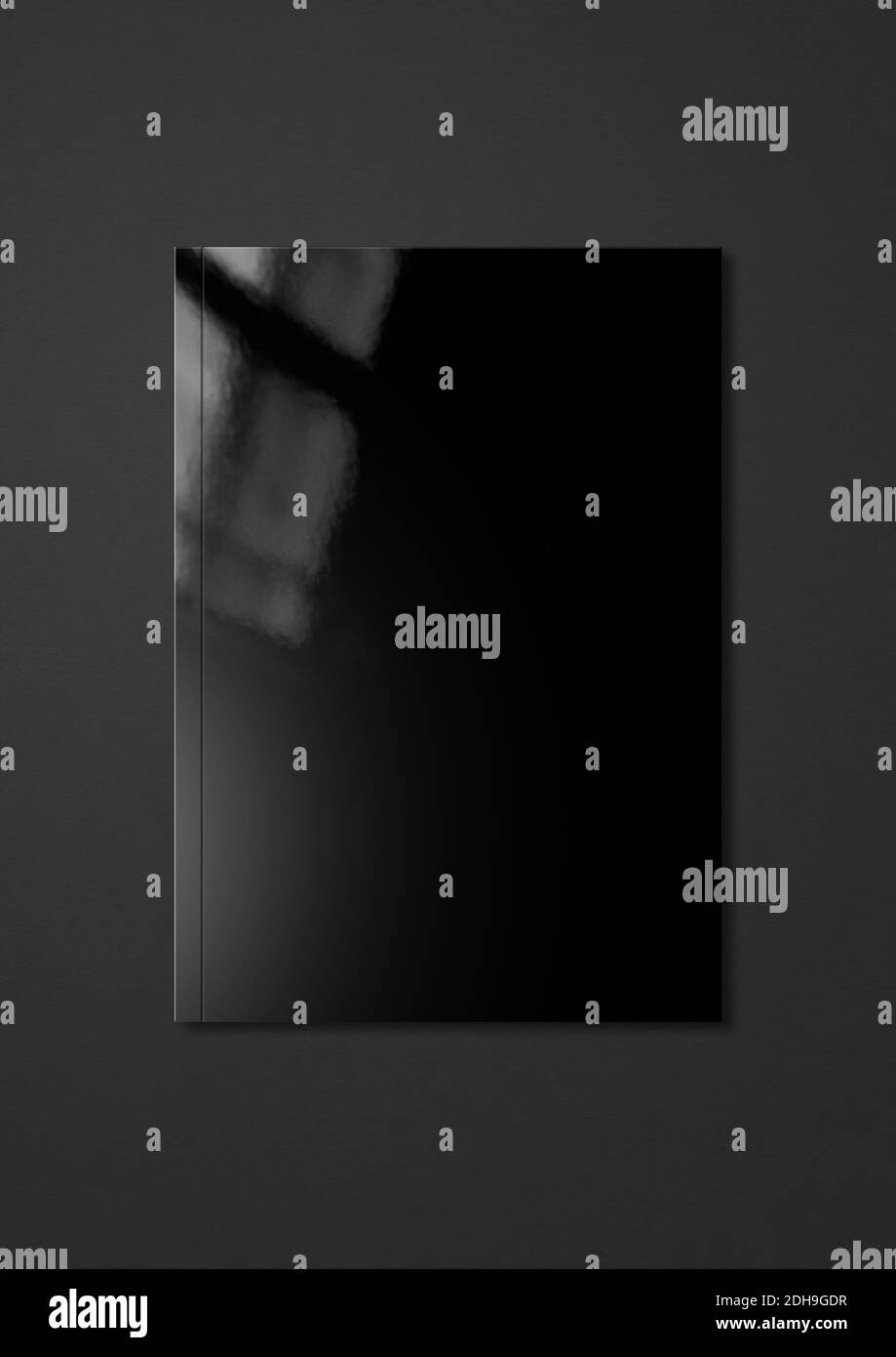 Modello copertina opuscolo nero su sfondo grigio scuro Foto Stock