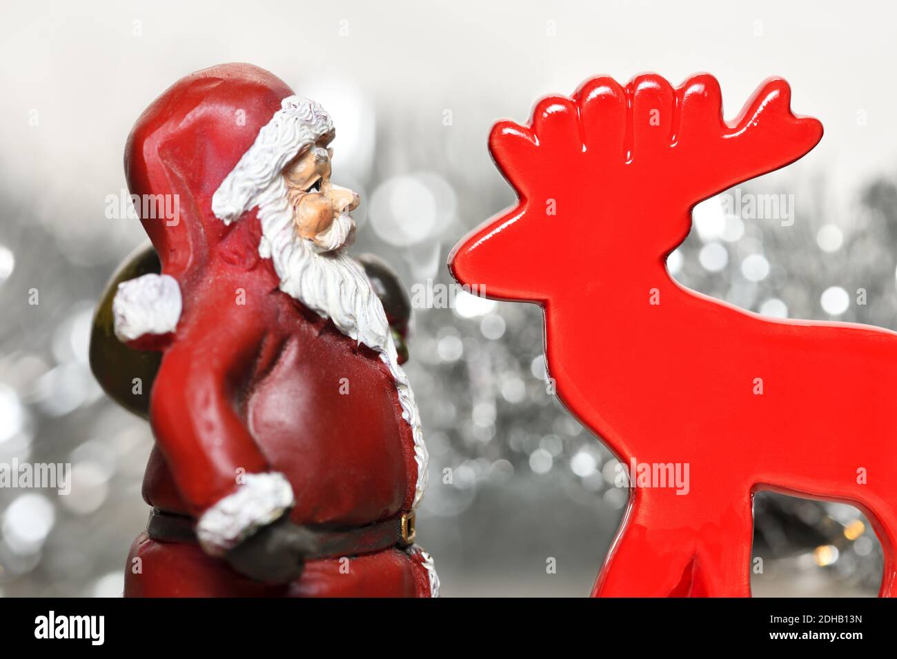 Weihnachtsmann und rentier Foto Stock
