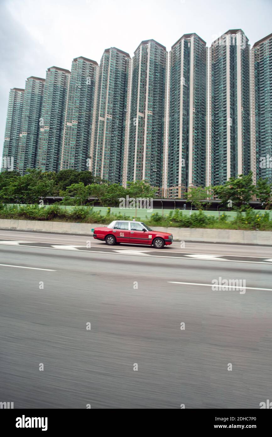 Moto Taxi sfocata in Hong Kong. Foto Stock