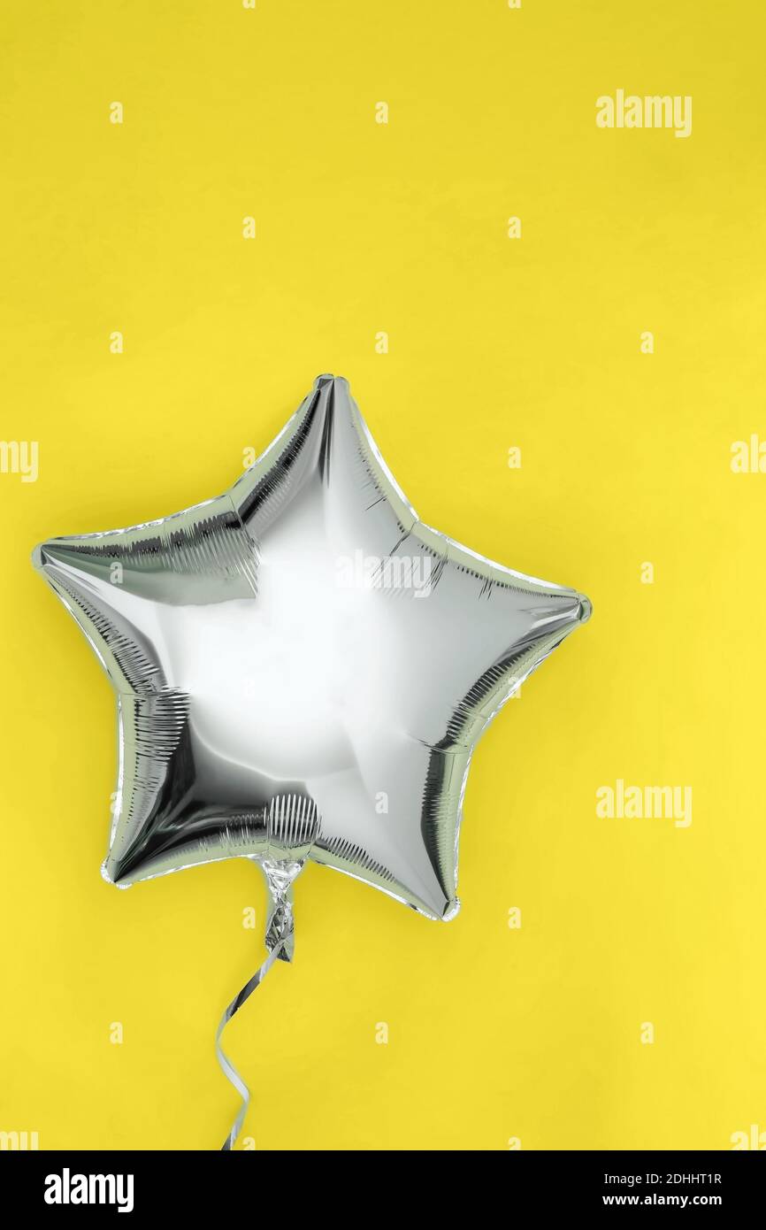 Palloncino a forma di stella con lamina di glitter argento Foto Stock
