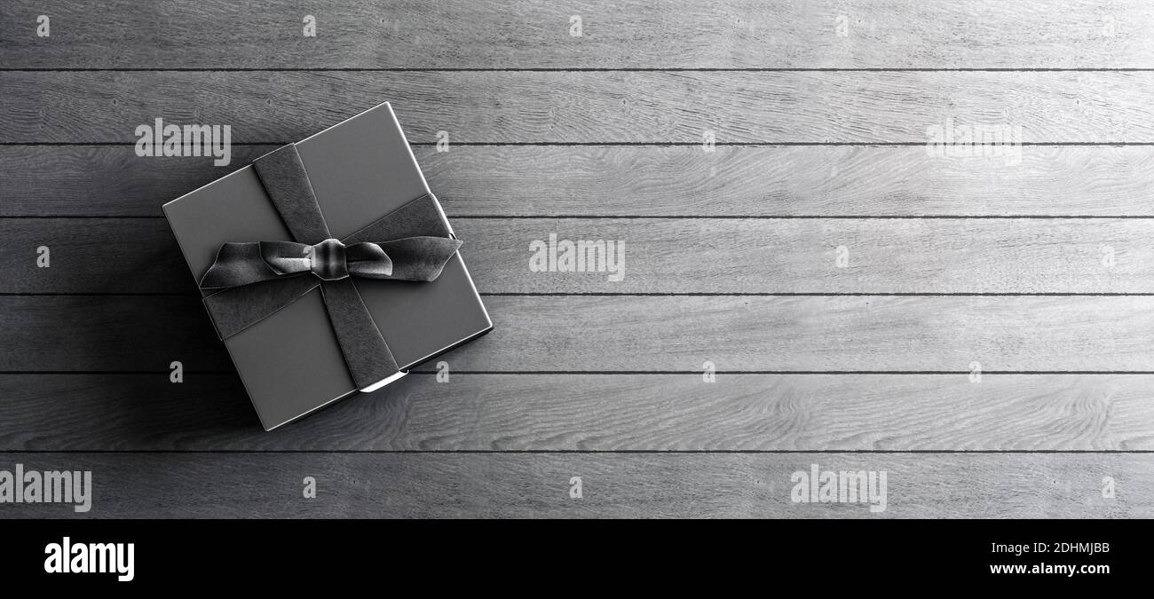 Poster in mock-up, confezione regalo nera di lusso con arco nero satinato su sfondo grigio tavole in legno afflitto, rendering 3D, illustrazione 3D Foto Stock
