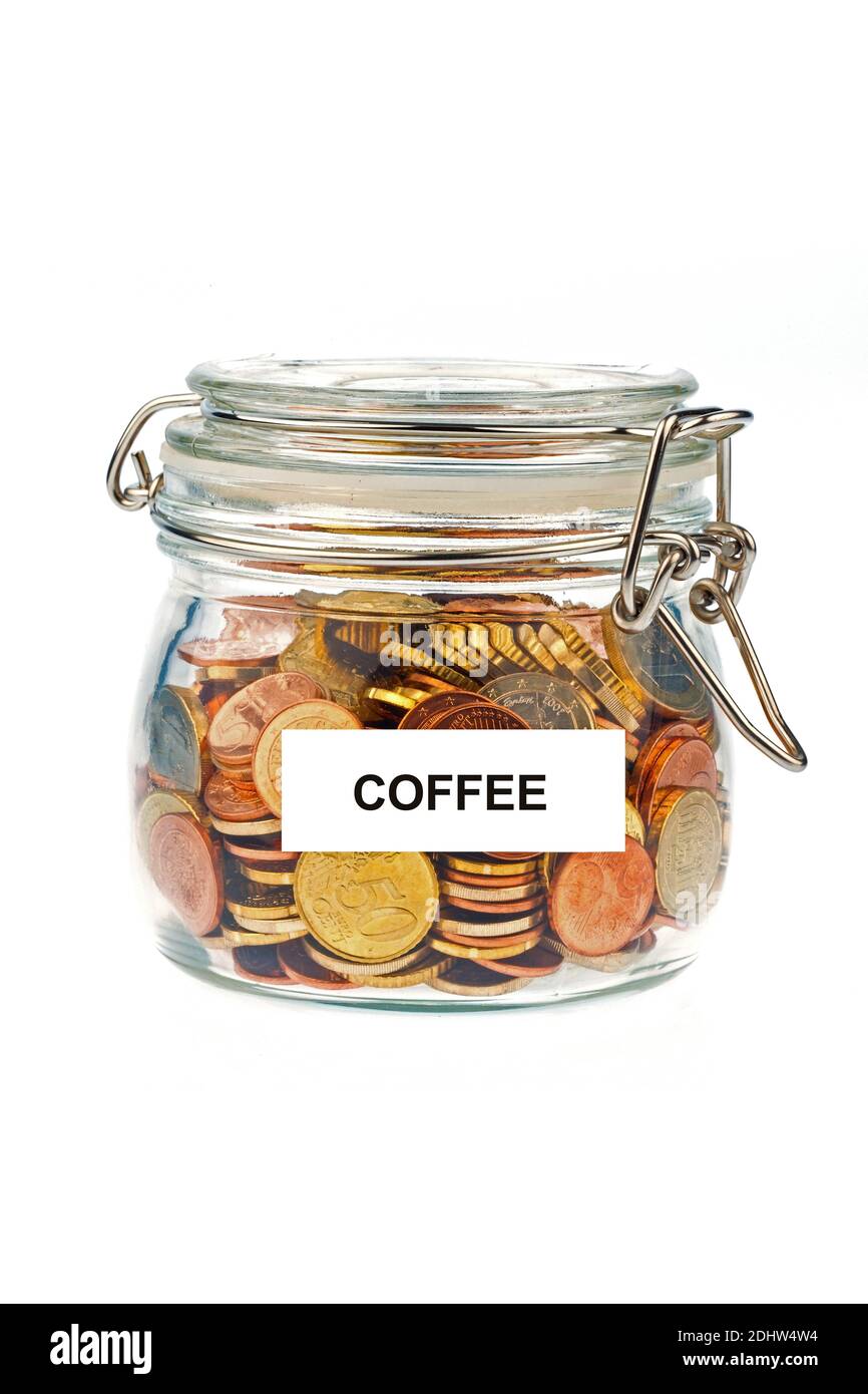 Ein Glas mit Münzen zum Sparen für die spätere previdenza, Anschaffungen, Kaffeekasse, Hochzeit, Urlaub, Versicherungen, Foto Stock