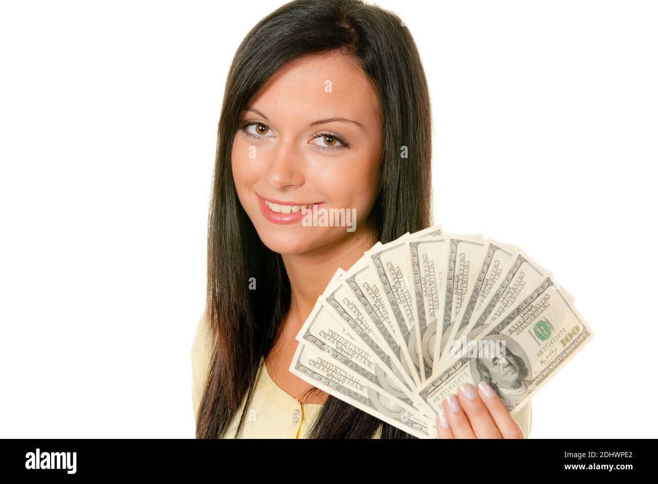 Junge Frau mit einem Bündel US-Dollars in der hand Foto Stock