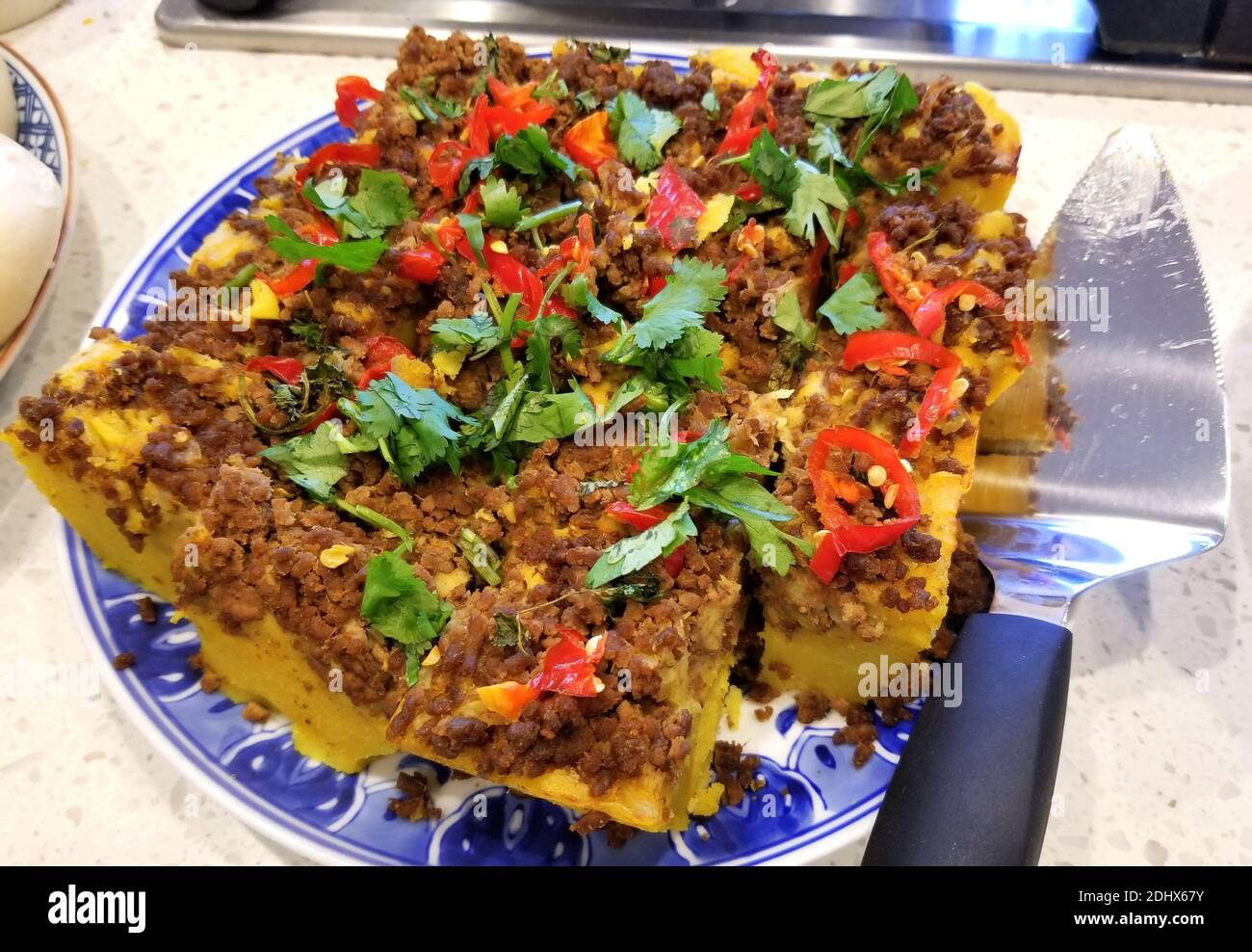 'Talam Lauk', le bocce di Singaporean a base di carne sminuzzata, coriandolo e peperoni caldi Foto Stock