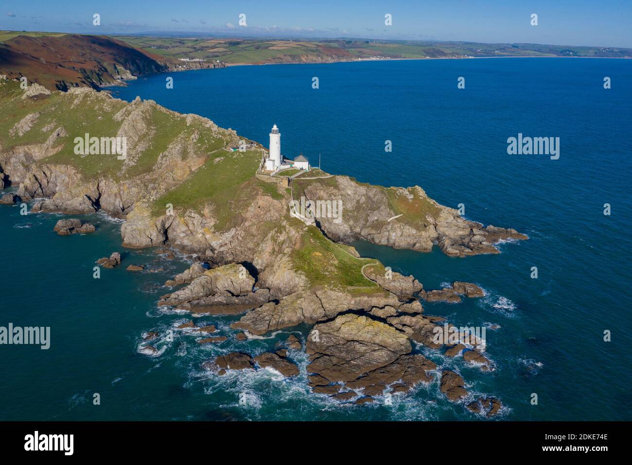Punto di partenza il faro in Devon. Foto Stock