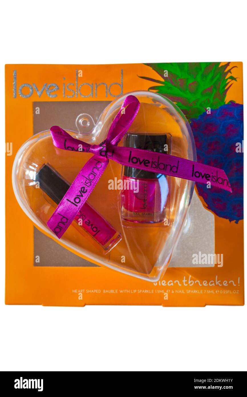 Love Island Heartbreaker cuore a forma di bauble con labbro scintillante & set regalo per unghie scintillante isolato su sfondo bianco Foto Stock