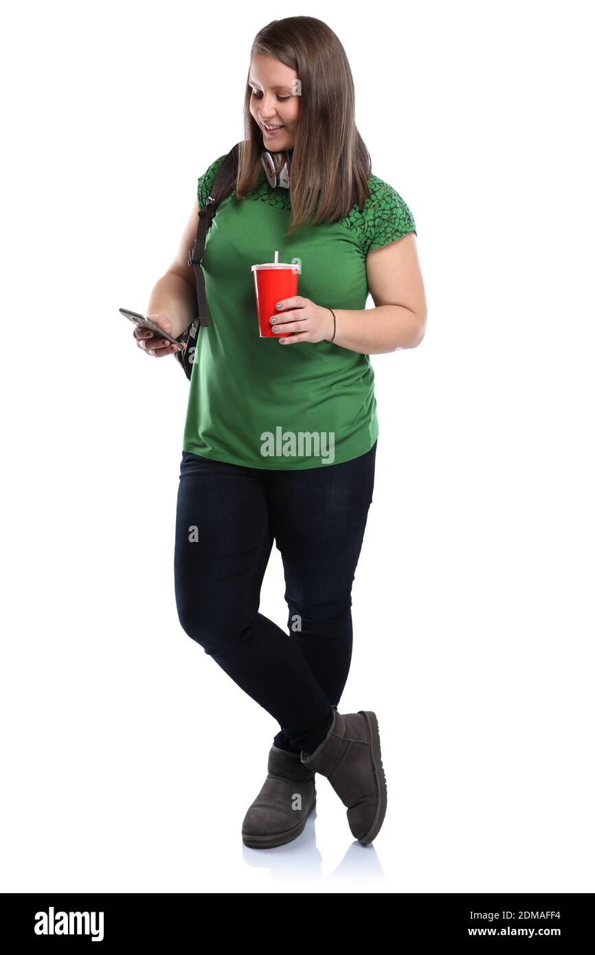 Studentin mit Handy Smartphone ritratto Ganzkörper Cola Getränk junge Frau jung Freisteller freigestellt auf weissem Hintergrund Foto Stock