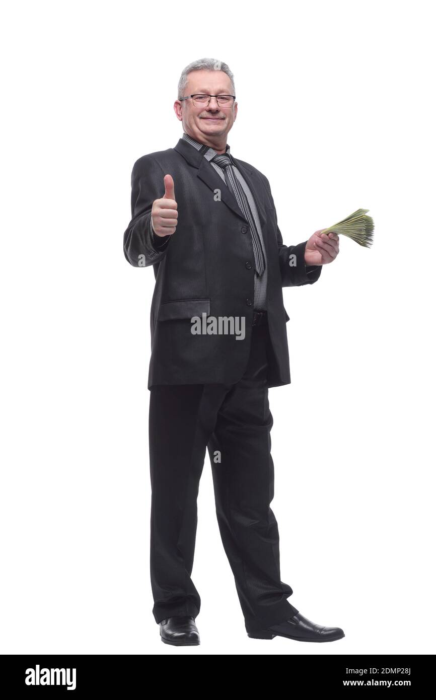 Uomo anziano che tiene mazzo di banconote su sfondo isolato g Foto Stock