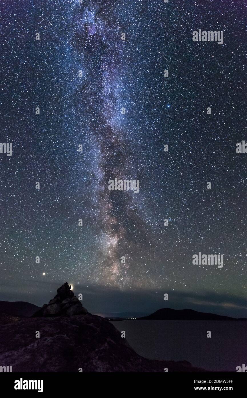 Giove e il centro galattico della Via Lattea sull'isola di Harris, Scozia Foto Stock