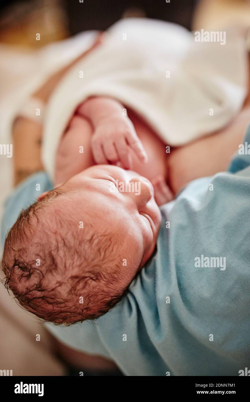Azienda madre neonato Foto Stock
