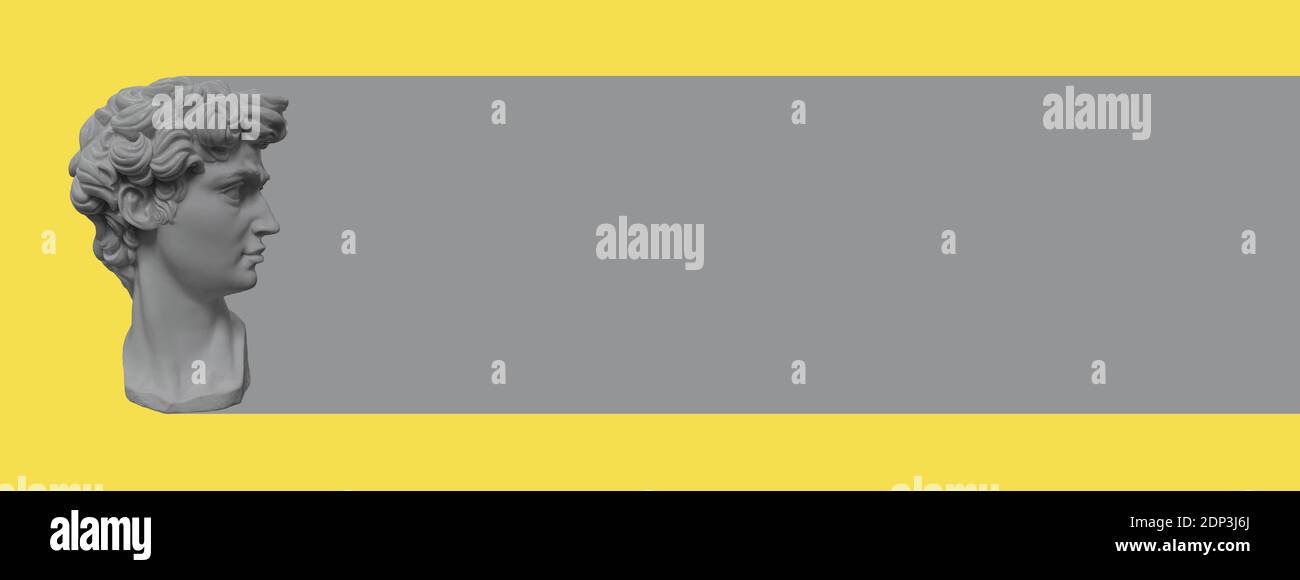 Testa della statua in gesso. Colore trendy giallo grigio. Banner creativo Foto Stock