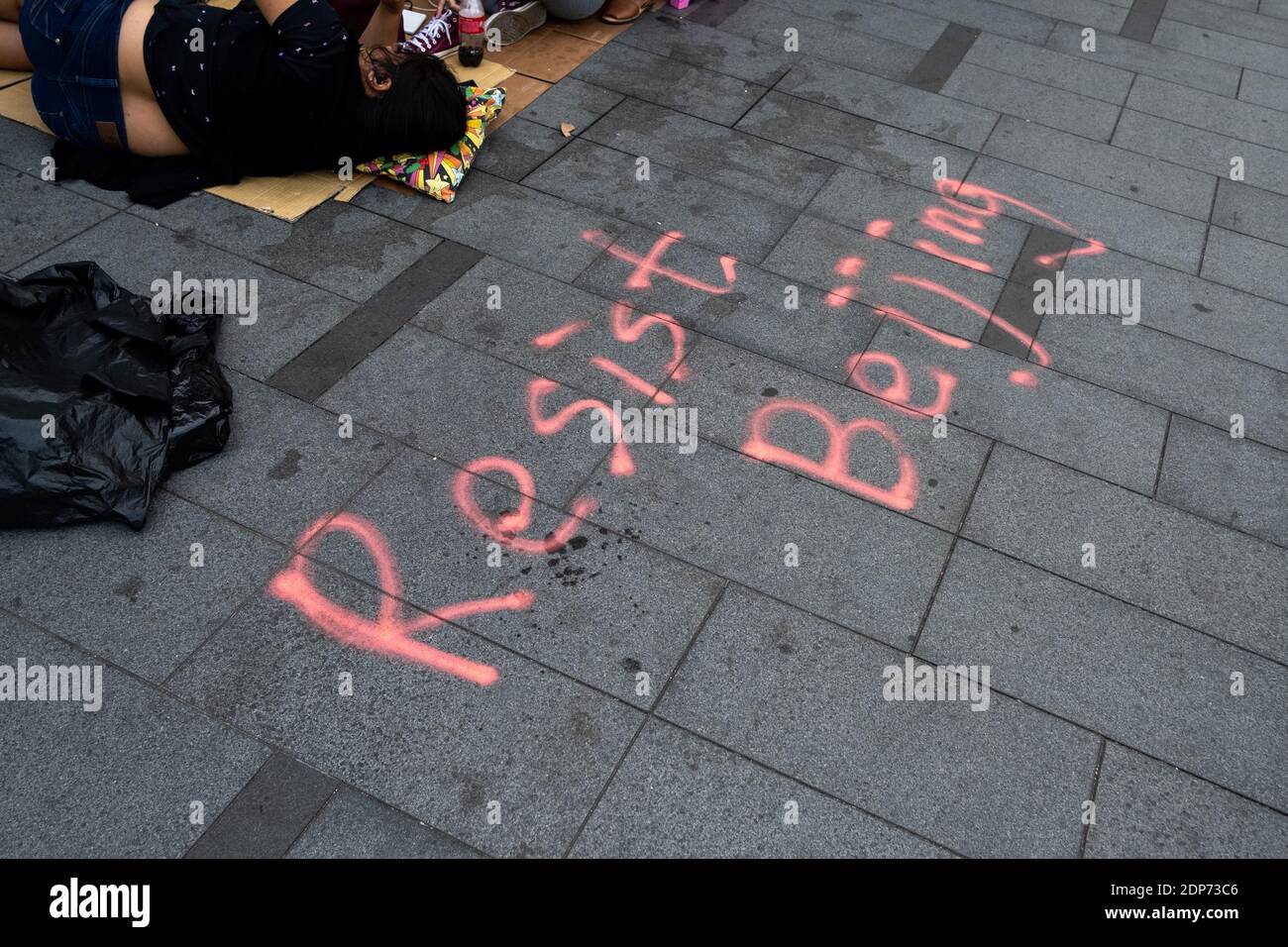 HONG KONG - PROTESTA - MARCHE VERS LE CONSULAT AMERICAIN Marche des manifestants hongkongais pro-democratie vers le consultat américain it rierciement Foto Stock