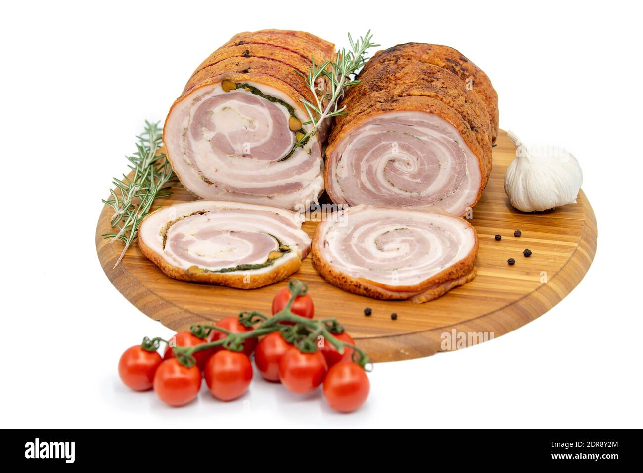 In casa la porchetta arrotolata arrosto con diverse erbe aromatiche Foto Stock