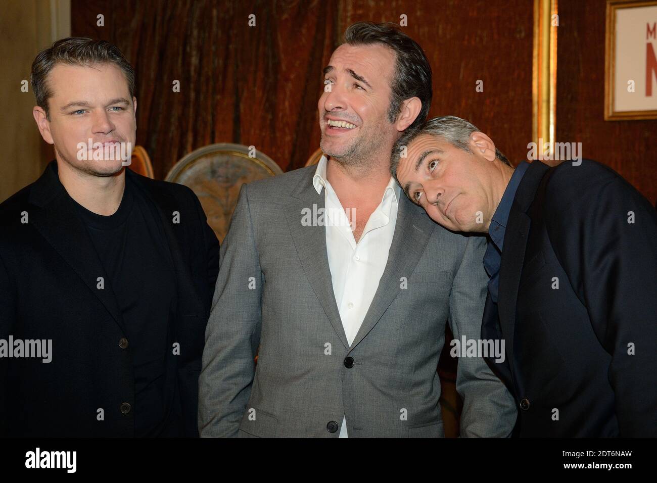 Matt Damon, Jean Dujardin, George Clooney alla fotocellula 'The Monuments Men' tenutasi all'Hotel Bristol di Parigi, Francia, il 12 febbraio 2014. Foto di Nicolas Briquet/ABACAPRESS.COM Foto Stock