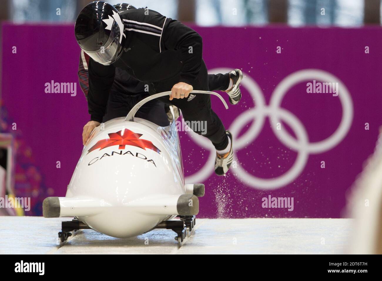 Il canadese Lyndon Rush pilota una corsa durante una sessione di addestramento maschile Bobsleigh a due uomini al Centro di scorrimento Sanki durante i Giochi Olimpici Sochi 2014, a Sochi, Russia, il 13 febbraio 2014. Le Olimpiadi di Sochi 2014 si terranno dal 07 al 23 febbraio 2014. Foto di Gouhier-Zabulon/ABACAPRESS.COM Foto Stock