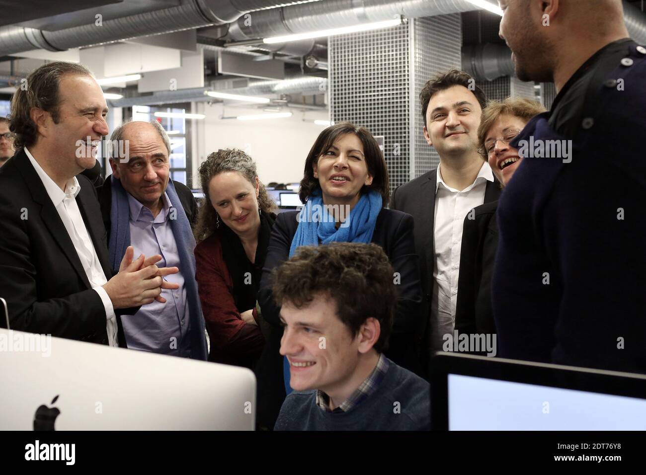 Fondatore del gruppo Iliad Free, Xavier Niel, candidato socialista al mayoral Anne Hidalgo Colombe Brossel e Jean-Louis Missika visitano l'università 42 a Parigi, Francia, il 19 febbraio 2014. Foto di Stephane Lemouton/ABACAPRESS.COM Foto Stock