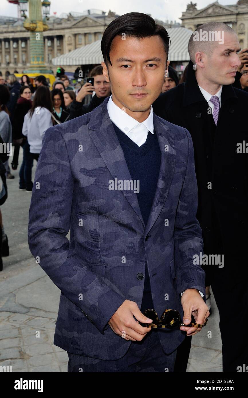 Nicholas TSE in arrivo per la mostra della collezione "Ready-to-Wear" di Valentino, Autunno-Inverno 2014/2015, tenutasi alle Tuileries di Parigi, Francia, il 4 marzo 2014. Foto di Aurore Marechal/ABACAPRESS.COM Foto Stock